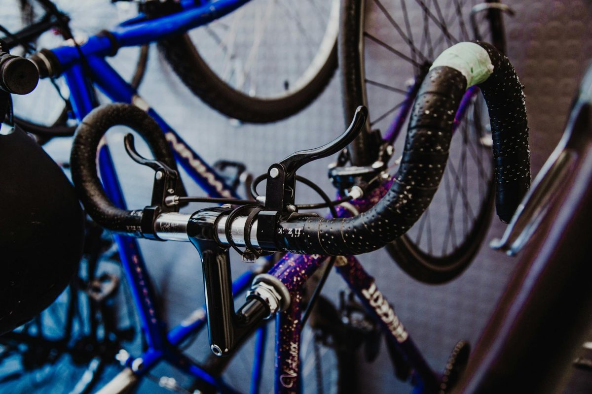 Detailed view of bicycle handlebars and brakes in an urban cycle shop.